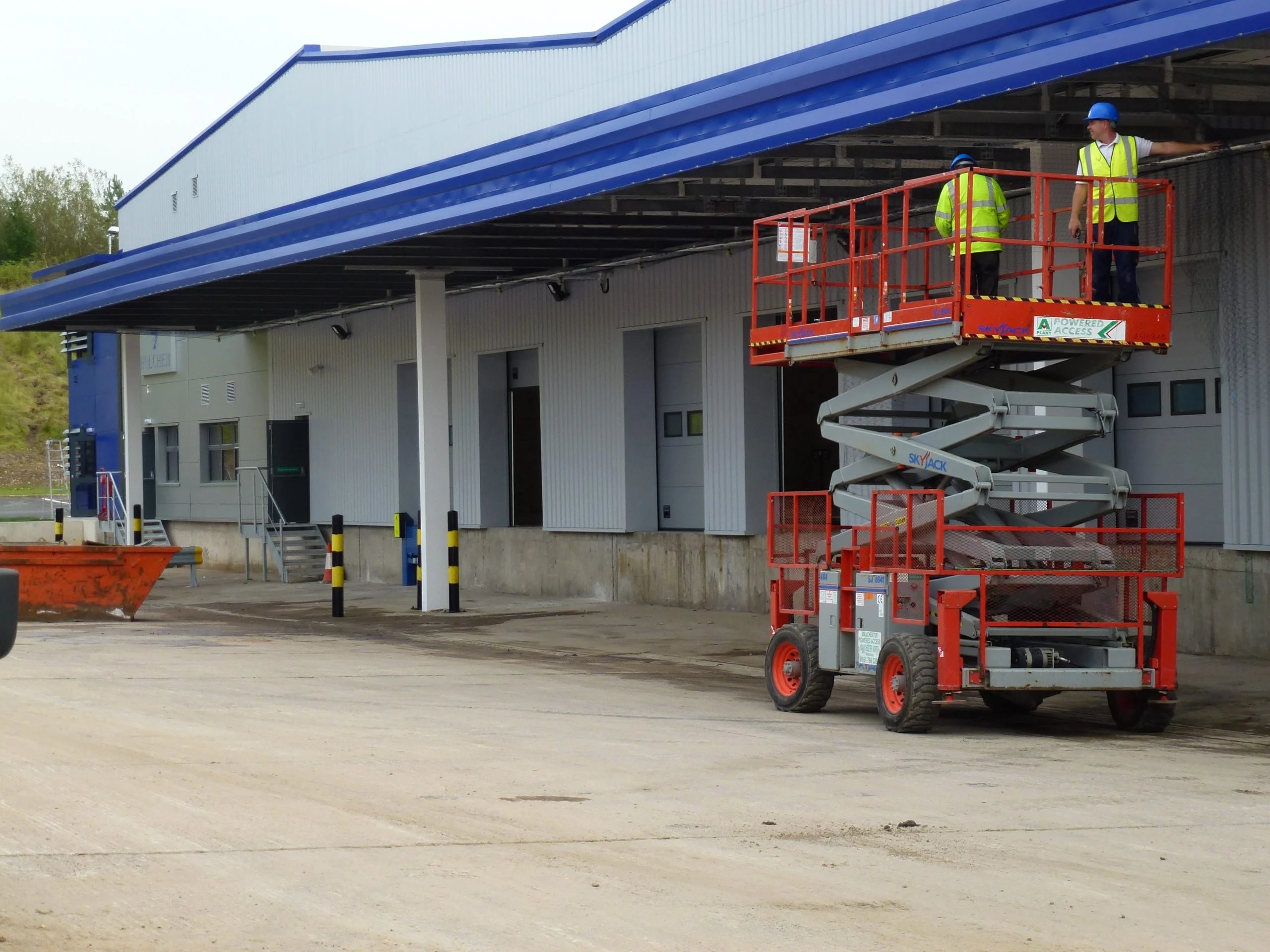 Bird netting fitted underneath a commercial entrance canopy