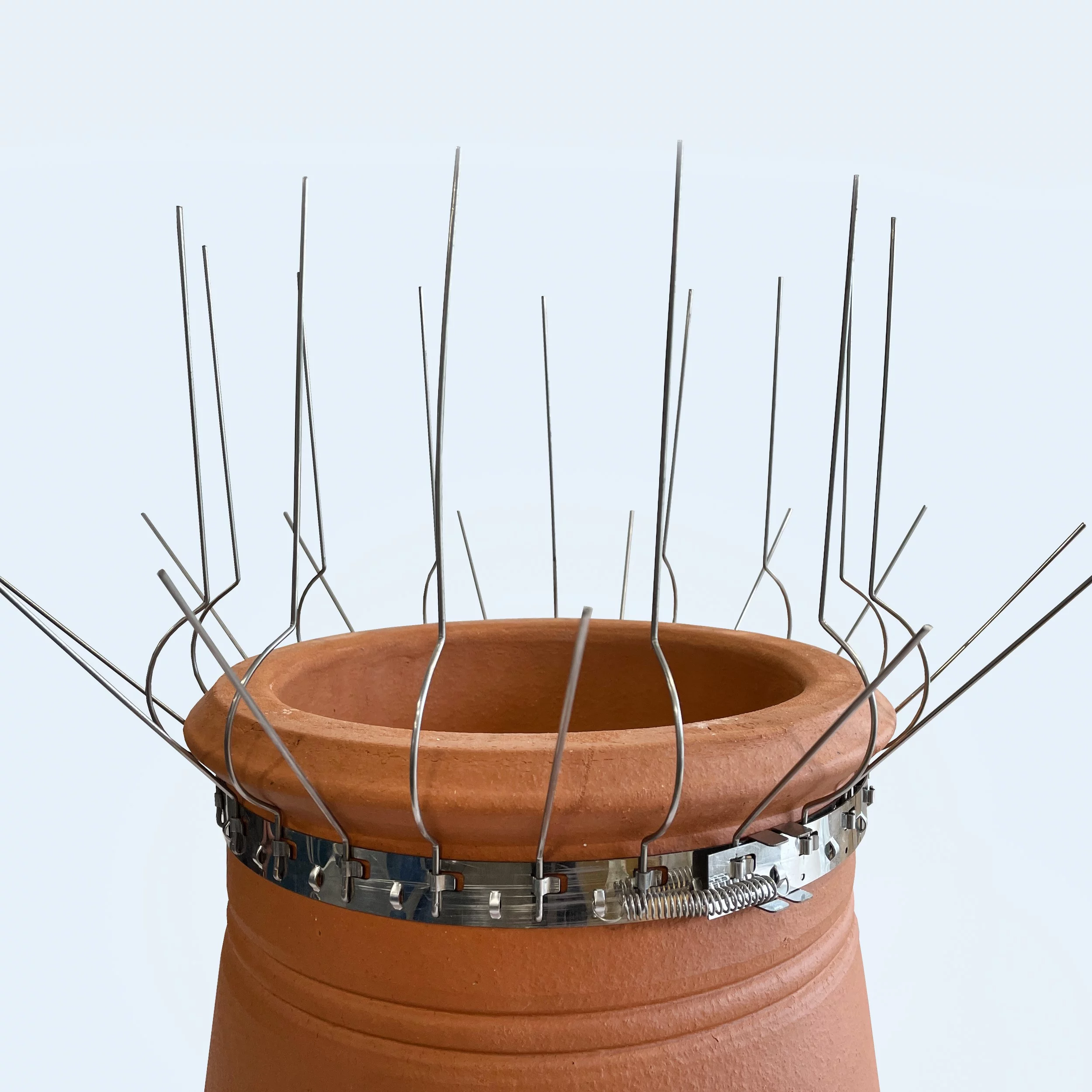 Stainless steel seagull spikes fitted to a chimney stack